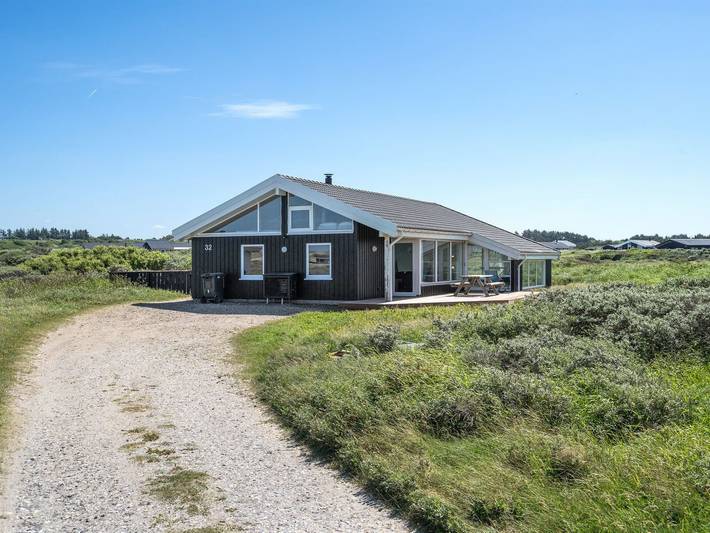 Ferienhaus für 7 Personen, mit Terrasse und Pool sowie Sauna in Nørlev Strand