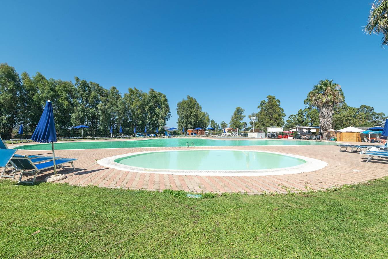 Holiday Home 'Casa Vacanze Olbia' with Shared Pool, Balcony and Air Conditioning in Le Vecchie Saline, Gallura