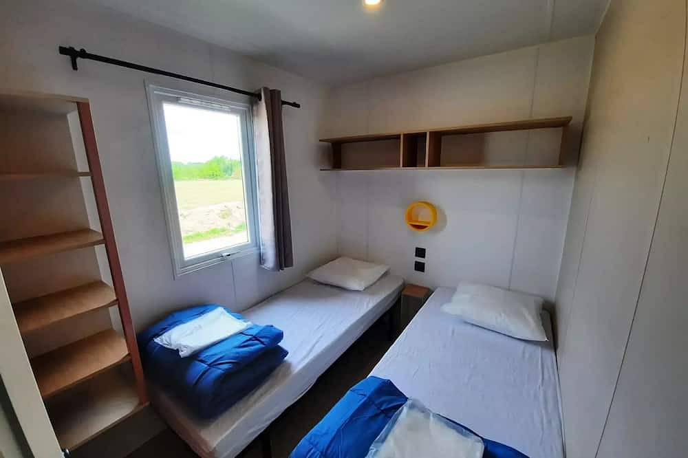 Mobil- home Prestige - 28 m² - 2 chambres 4 Ã  6 personnes - 4 pers. inclus dans le tarif in Ambon, Côte des Mégalithes