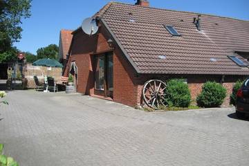 Gîte pour 4 personnes, avec terrasse à Rhauderfehn