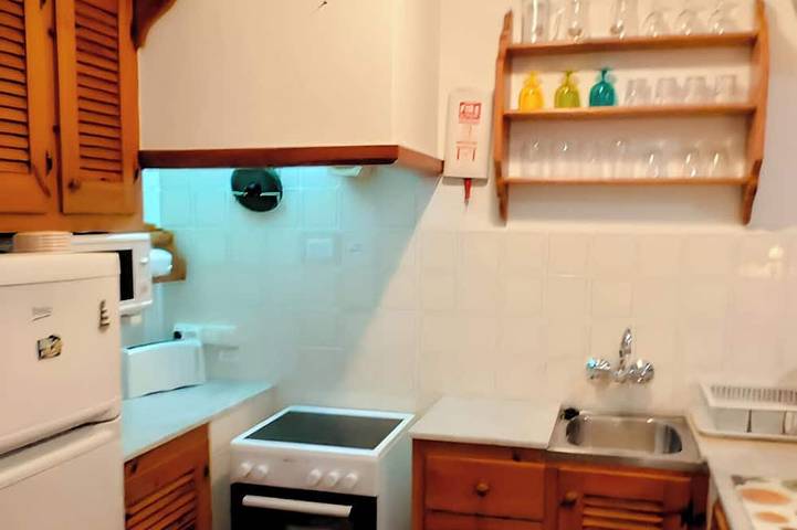 Ganze Wohnung, Apartment with beautiful sea views, gardens, swimming pool and very well located. in Arenal d'en Castell, Es Mercadal