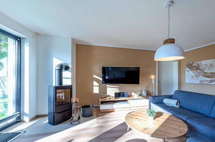 Ferienwohnung für 4 Personen, mit Balkon und Garten sowie Sauna und Seeblick