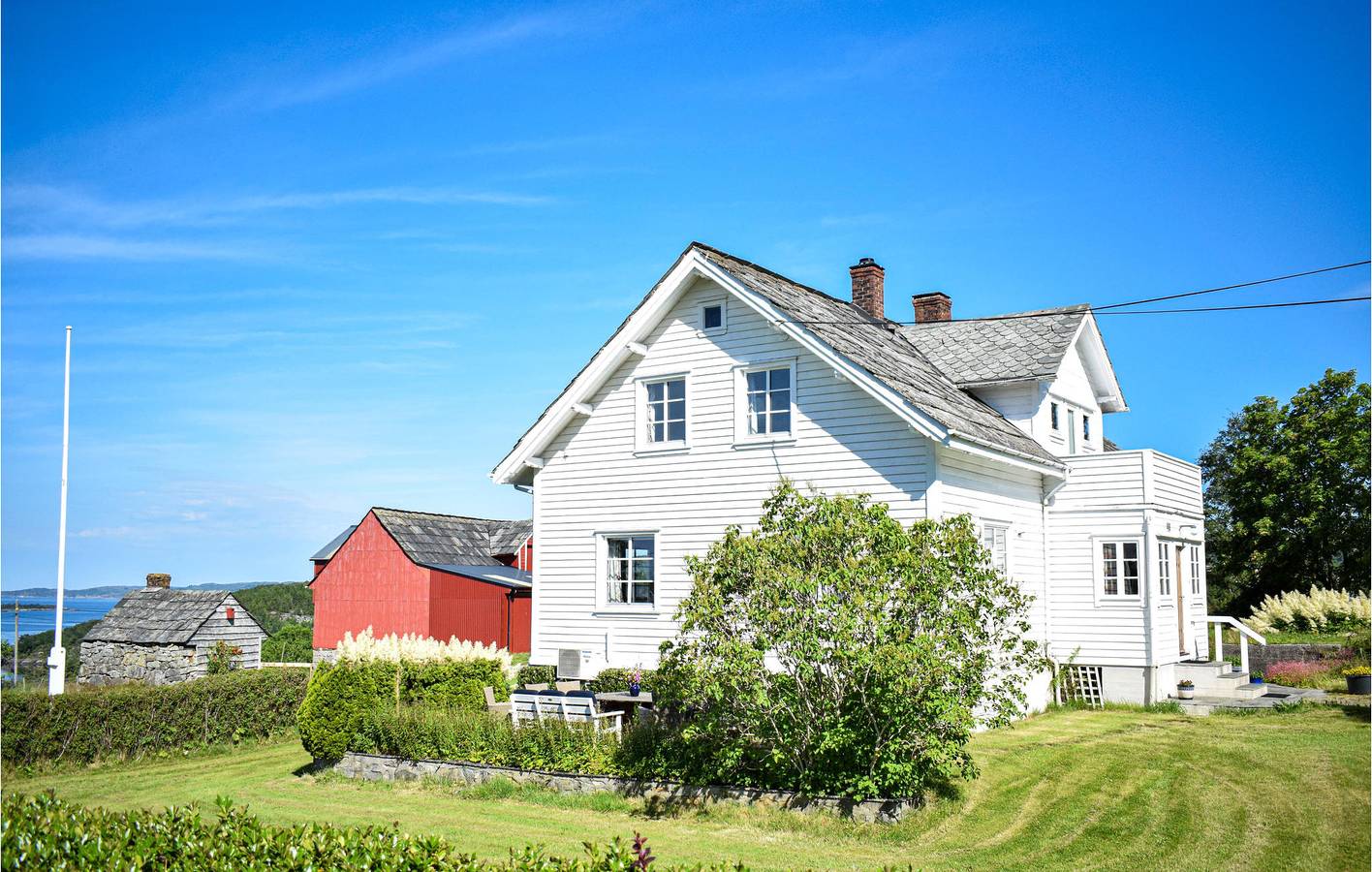 Ferienhaus für 8 Personen mit Garten in Fitjar