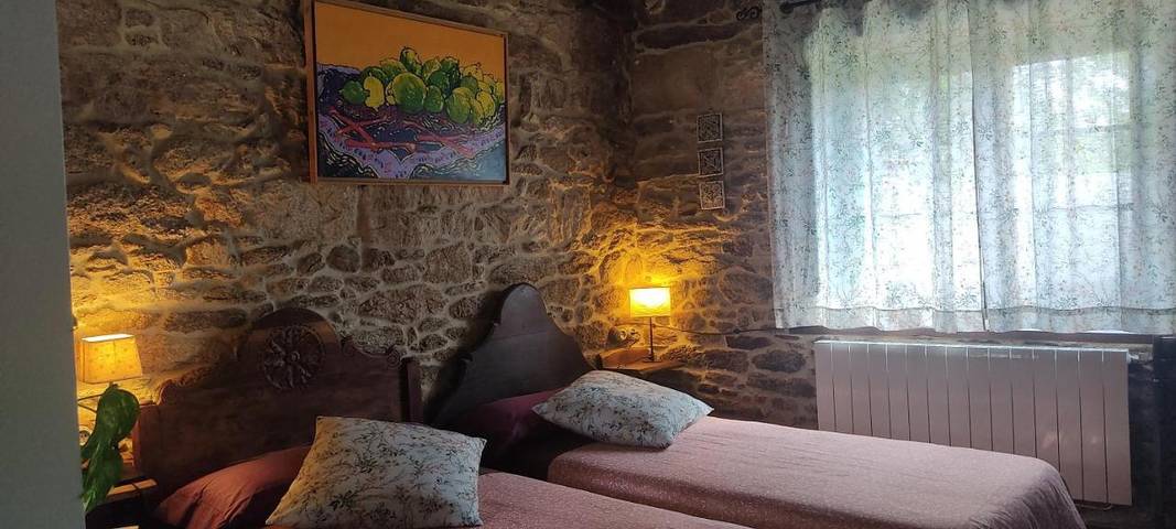 Location de vacances pour 6 personnes, avec Terrasse ainsi que Jardin et Vue à Guitiriz
