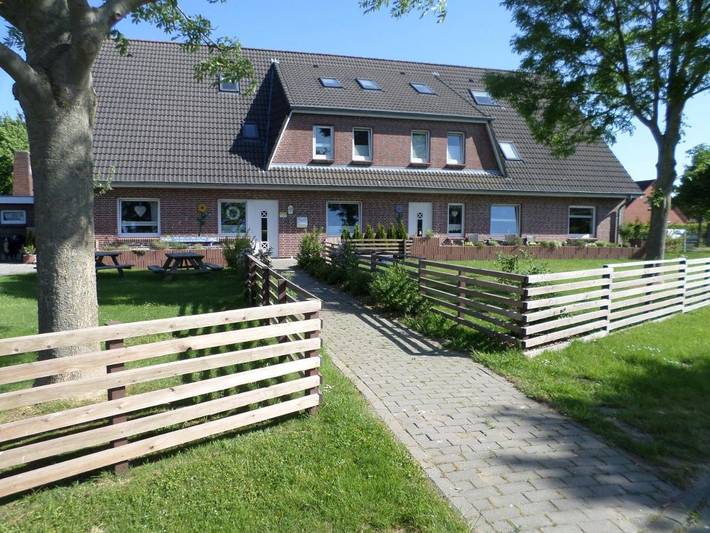Ferienwohnung für 4 Personen, mit Terrasse und Garten sowie Ausblick in Dagebüll