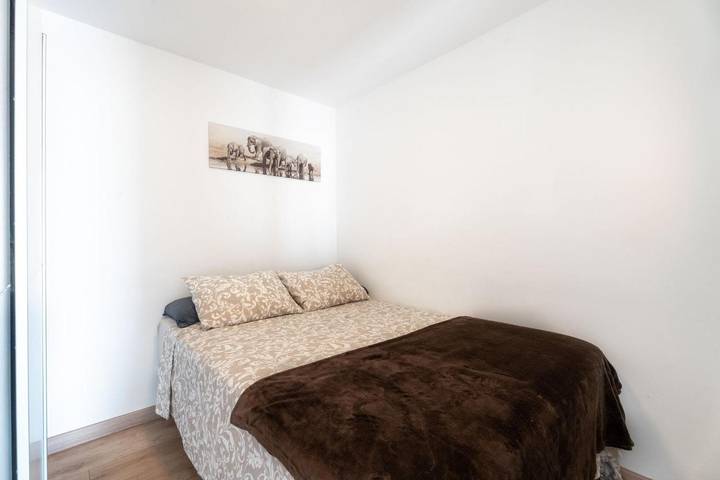 Apartamento entero, Apartamento vacacional 'Ático con barbacoa y terraza' con vistas al mar, terraza privada y Wi-Fi in Fañabé, Adeje