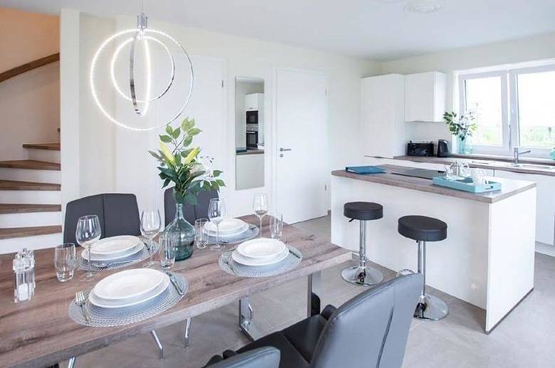 Exklusives Ferienhaus Finja mit Sauna, Garten & offener Wohnküche in Burhave, Butjadingen