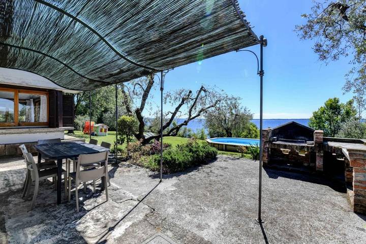 Villa per 8 persone, con Terrazza e Giardino nonché Piscina e Vista lago a Moniga del Garda