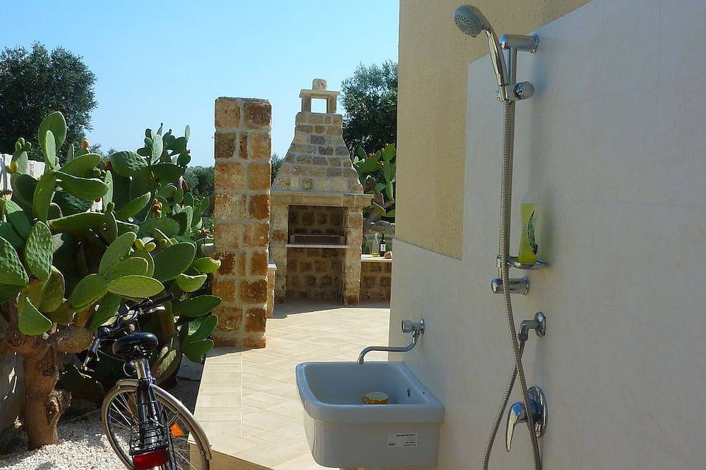 Stylish villa with beautiful views from the roof terrace over olive groves to the sea in Specchiarica, Manduria