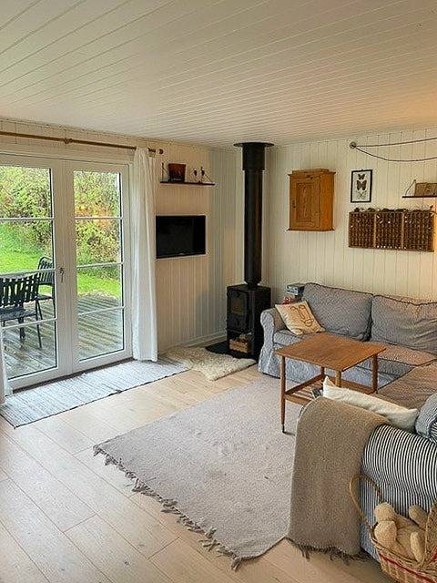 Ferienhaus mit Sonnenuntergang über der Sejerø-Bucht in Veddinge, Asnæs