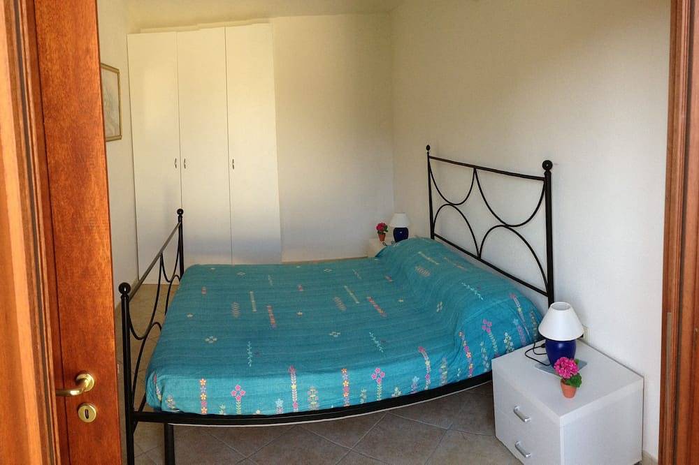 Chia: Cottage with garden, air conditioning, barbecue,and parking. in Cagliari Province