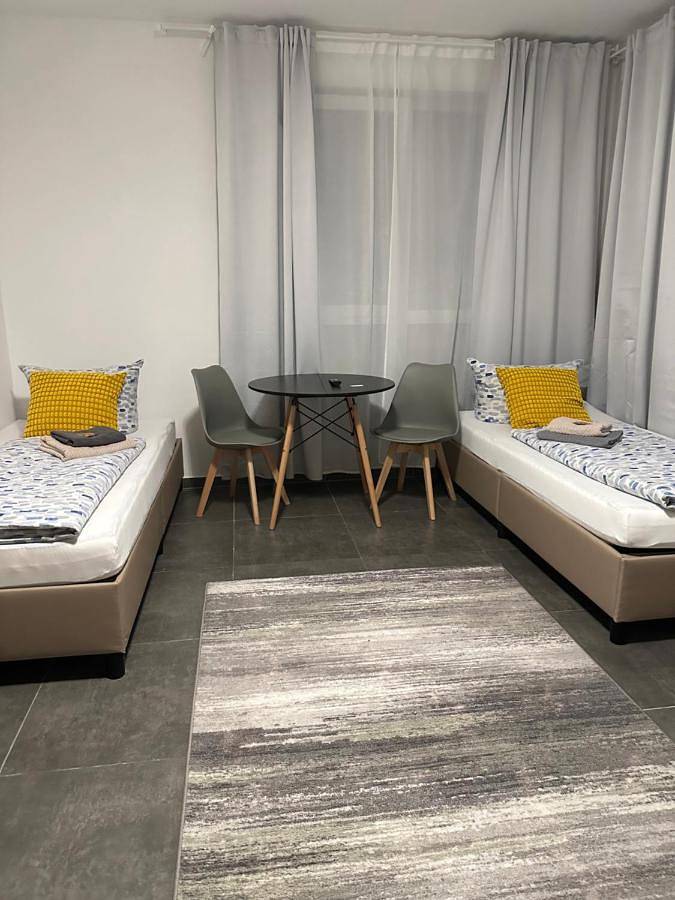 Appartement de vacances entier, Gemütliches Doppelzimmer Gemeinschaftsbad in Dingolfing, Bavière Orientale