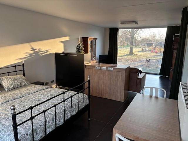 Location de vacances pour 2 personnes, avec piscine et vue ainsi que jardin et terrasse à Nazareth (Belgique)