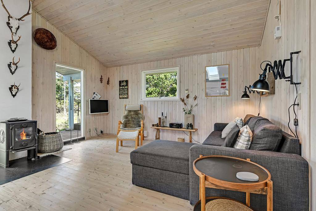 Small, cosy holiday home with annex and great wooden terraces in Ulfborg, Nissum Fjord