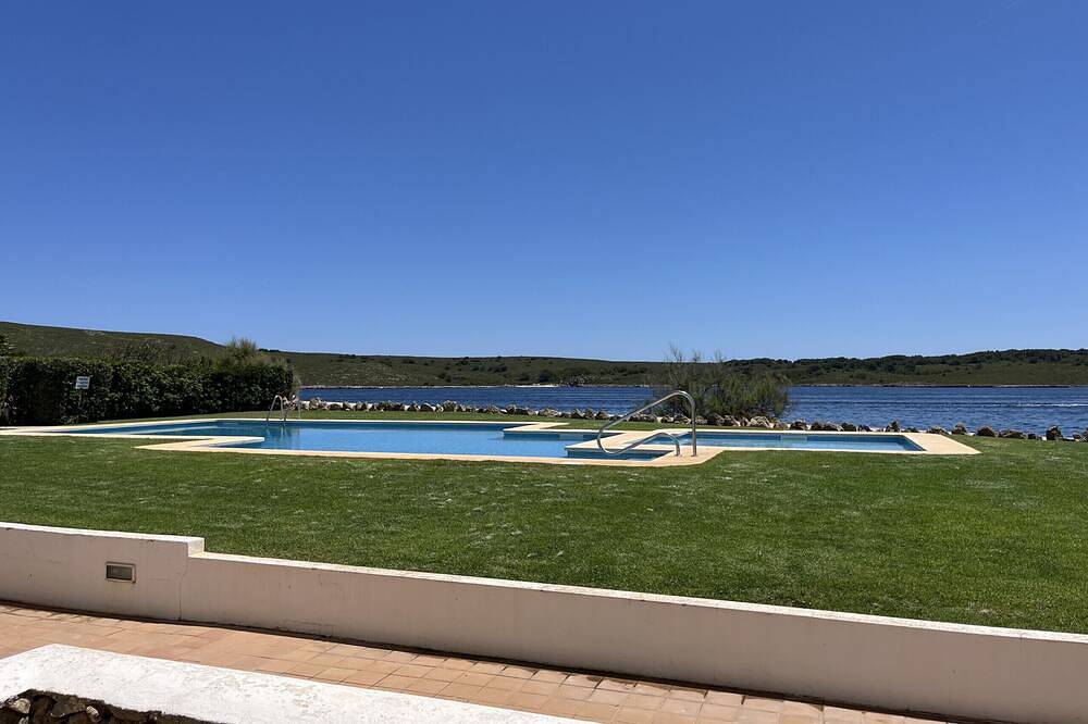 Entire apartment, Very front line stunning sea views near the beach in Fornells, Es Mercadal