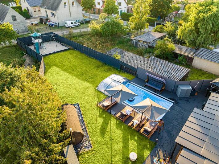 Ferienhaus für 8 Personen, mit Garten und Sauna sowie Ausblick und Pool, mit Haustier an der Müritz