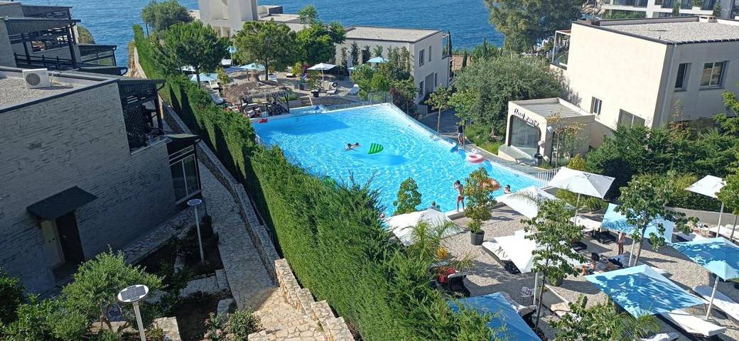 Appartement de vacances pour 4 personnes, avec Balcon et Terrasse ainsi que Jardin et Bassin pour enfant