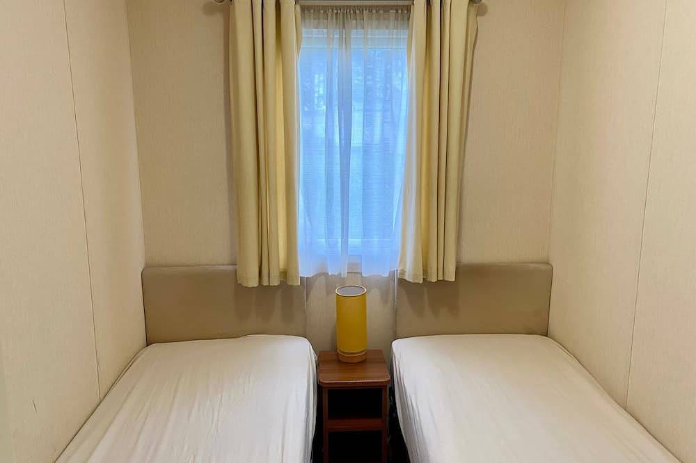 Lotus 2 bedroom dog friendly caravan with veranda offers a stunning sea view. in Poole, Poole Harbour