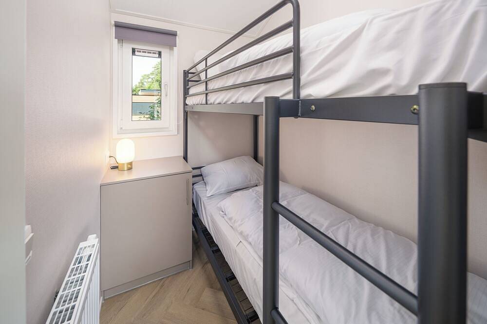 Die Doornenburg Lodge bietet eine komfortable Ferienunterkunft für 6 Personen mit modernen Annehmlichkeiten und einer eigenen Terrasse in der Veluwe. in Veluwe