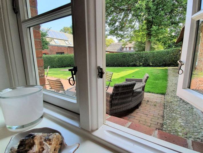 Ganze Ferienwohnung, Traumkoje - Wohnung 5 - Ferienwohnung Traumkoje - mit Sauna, Terrasse & Parkplatz in Alkersum in Nordfriesische Inseln (Schleswig-Holstein) (Schleswig-Holstein), Alkersum