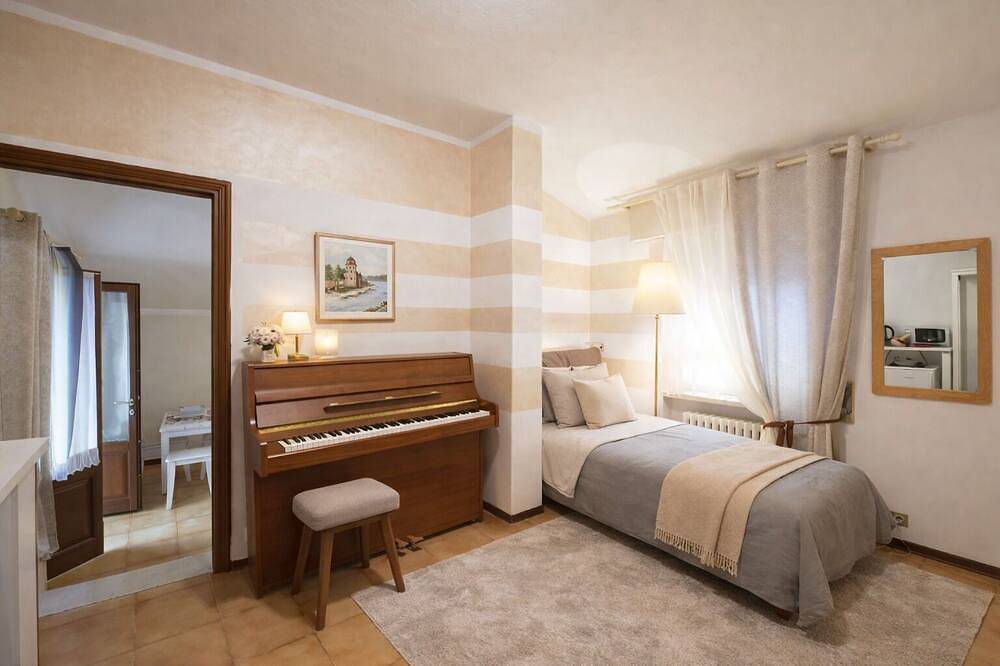 Musiksuite mit Seeblick in Torri del Benaco, Gardasee-Berge