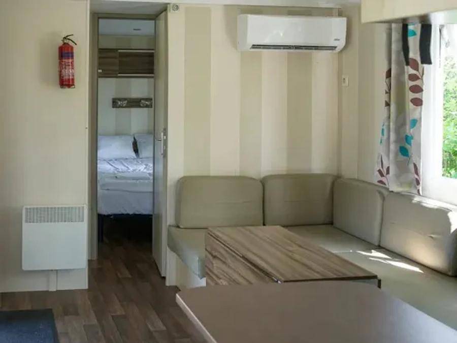 Camping Marvilla Parks Friese Meren - Stacaravan 6 personen - Comfort 2 slaapkamers Lounge in IJsselmeer