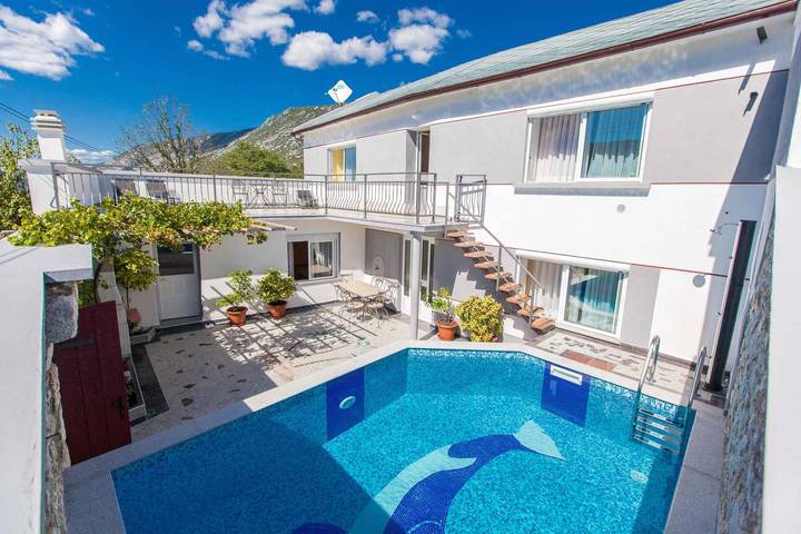 Ferienhaus für 8 Personen, mit Garten in Tribalj