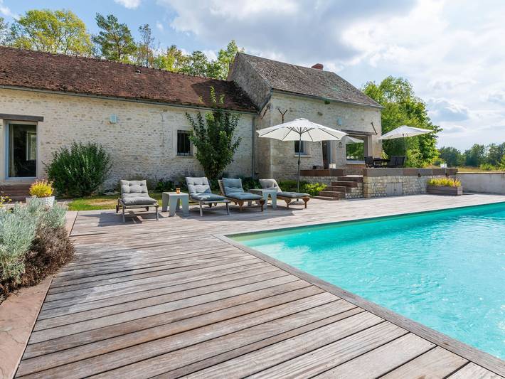 Maison de vacances pour 2 personnes, avec Terrasse ainsi que Jardin et Piscine dans Loiret
