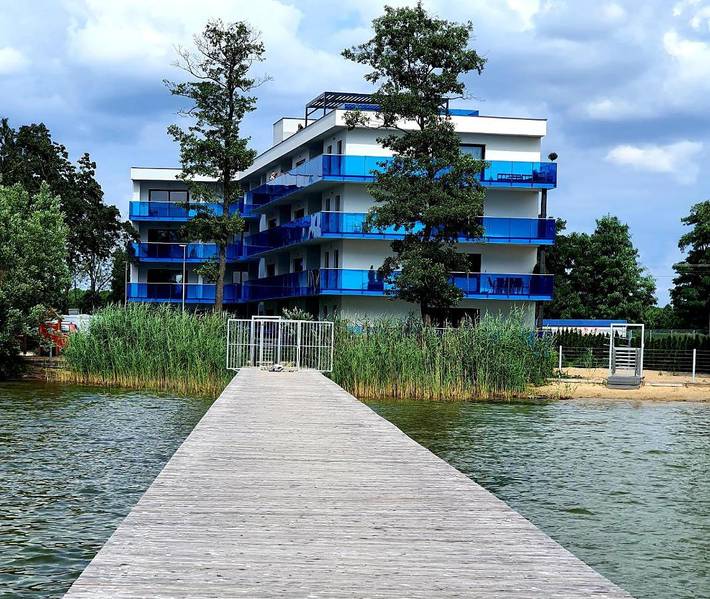 Apartament wakacyjny dla 4 osób, z widok i ogród oraz widok na jezioro, zwierzęta dozwolone w Boszkowo
