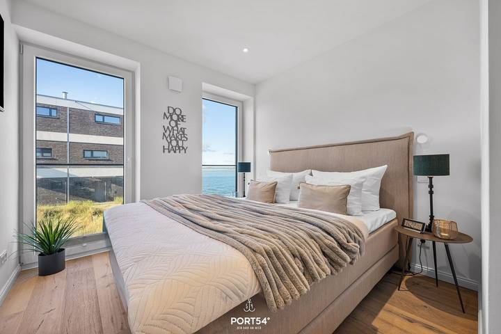 Ganze Wohnung, Strandfeder - 1. Reihe am Wasser, Meerblick, 2 Balkone, Sauna, E-Ladestation in Olpenitz, Kappeln