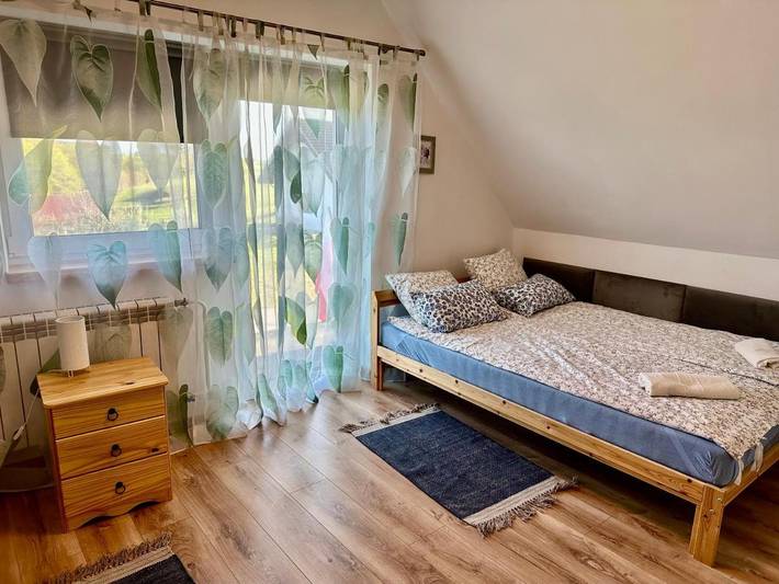 Ferienwohnung für 8 Personen, mit Ausblick und Garten sowie Seeblick