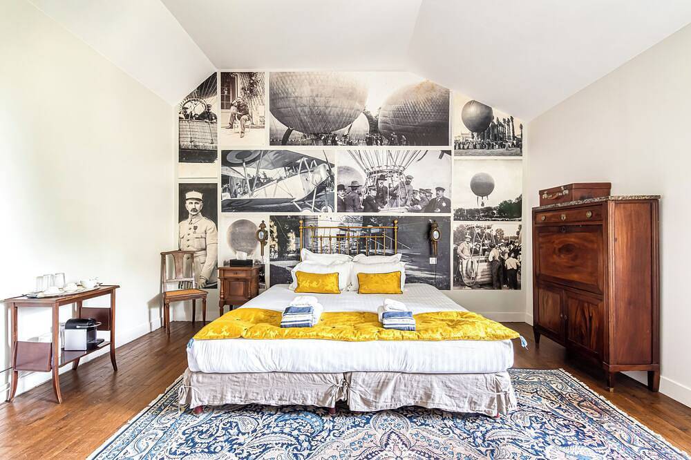 Lavishly decorated double room at Château Le Fresne in Bouchemaine, Angers region