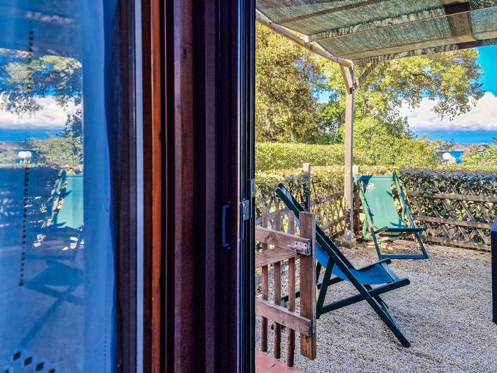 Appartamento intero, Per trascorrere delle ore piacevoli in coppia con una vista da sogno - Appartamenti Le Querce - Uva in Naregno, Capoliveri
