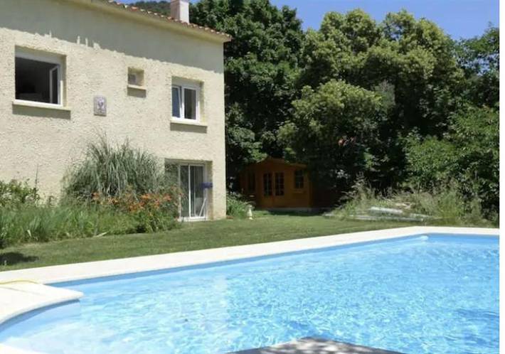 Appartement de vacances pour 4 personnes, avec jardin ainsi que piscine et vue