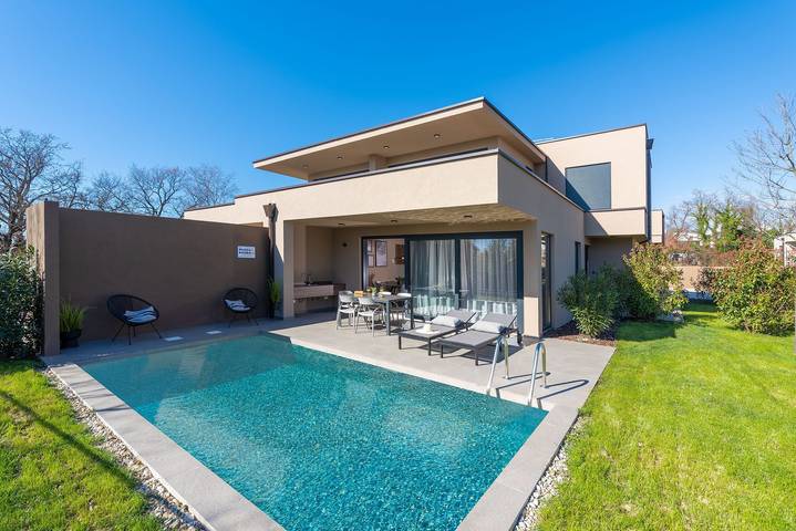 Ferienwohnung für 5 Personen, mit Balkon/Terrasse und Garten sowie Pool in Umag und Umgebung