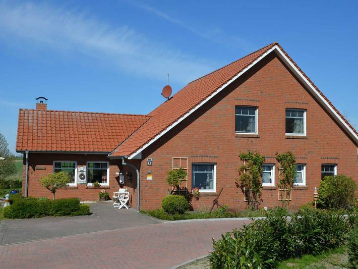 Ferienwohnung für 3 Personen, mit Ausblick und Terrasse sowie Sauna und Garten in Bunde