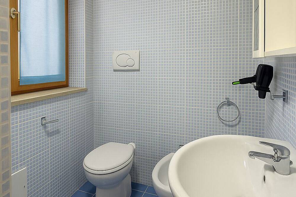 Apartamento De Tres Habitaciones A 35O Mt De La Playa in Budoni, Olbia-Tempio