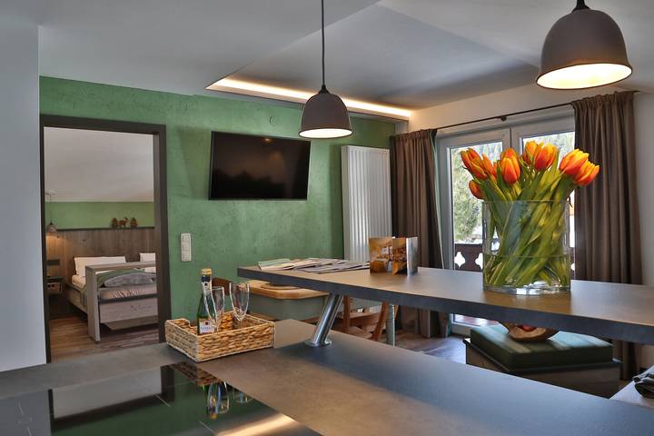 Ferienwohnung für 3 Personen, mit Balkon und Garten sowie Sauna und Ausblick