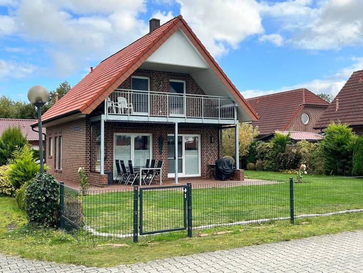 Ferienhaus mit Meerblick für 7 Personen, mit Balkon und Terrasse sowie Garten und Seeblick