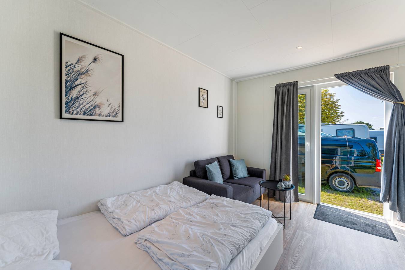Gästehaus 'Surfbrett 1 – Zimmer mit Deichblick' mit Gemeinschaftsgarten und Wlan in Dahme, Ostholstein