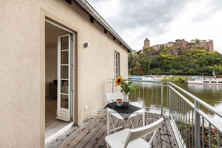 Ferienwohnung für 2 Personen, mit Balkon und Garten sowie Seeblick in Halle