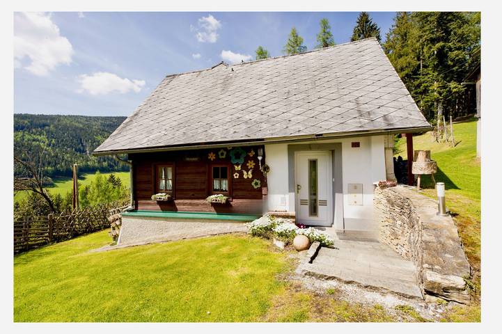 Ferienhaus für 4 Personen, mit Terrasse und Garten sowie Ausblick
