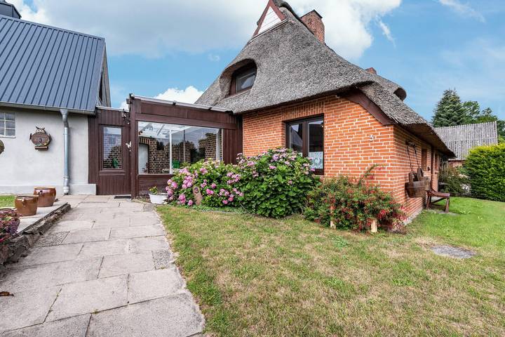 Ferienhaus für 4 Personen, mit Seeblick und Garten in Schleswig-Holstein