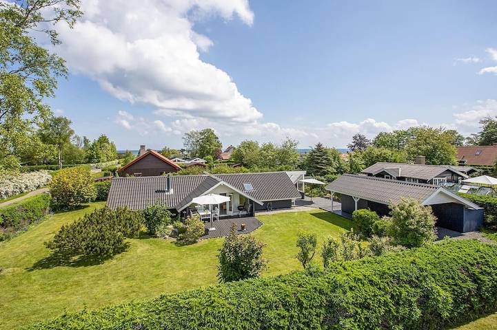 Ferienhaus für 6 Personen, mit Terrasse und Garten sowie Sauna in Dyngby Strand