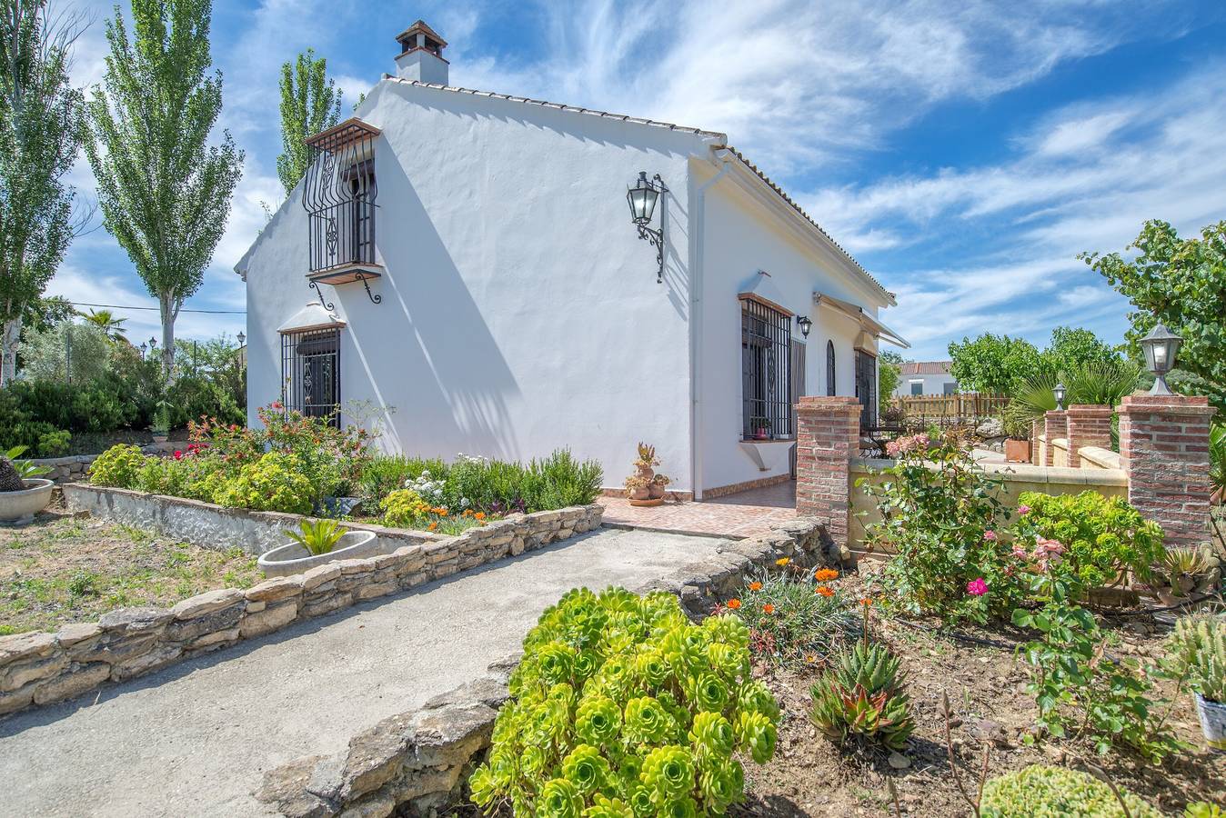 Villa Victoria : jardin, piscine d'eau salée, terrasse, Wi-Fi – animaux acceptés in Arriate, Province de Málaga