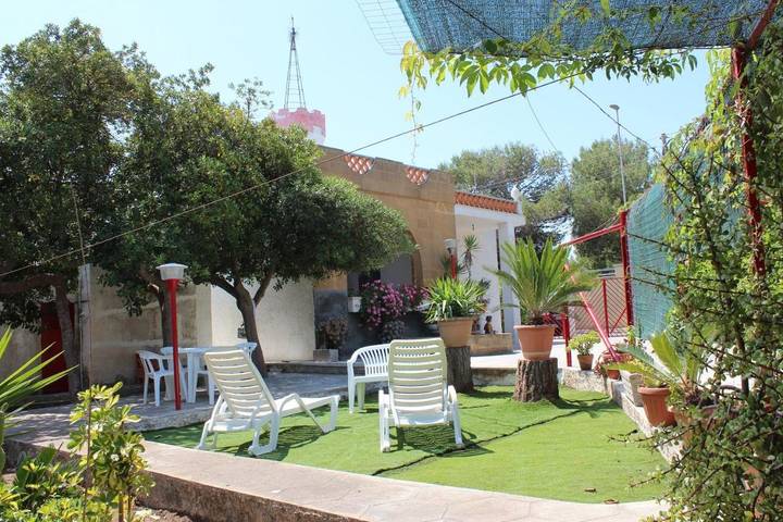 Casa vacanza per 6 persone, con Balcone e Terrazza nonché Giardino e Panorama a Torre Chianca