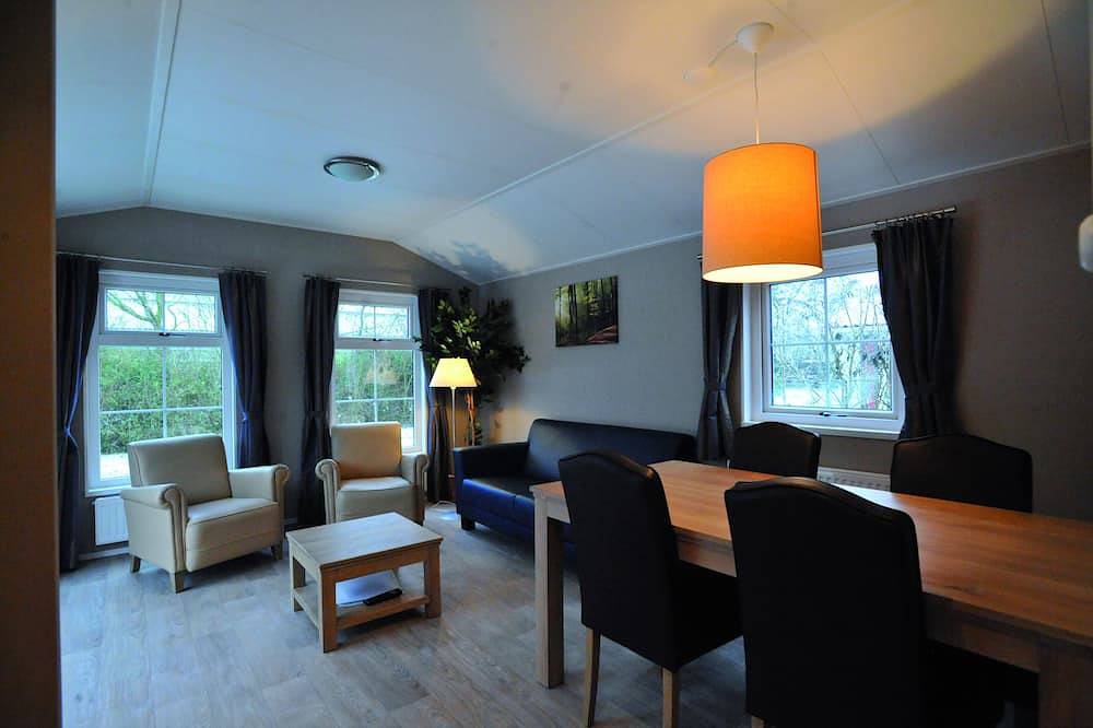 Gemütliches Chalet mitten im Grünen in der Nähe des Banjaardstrandes in De Banjaard, Kamperland