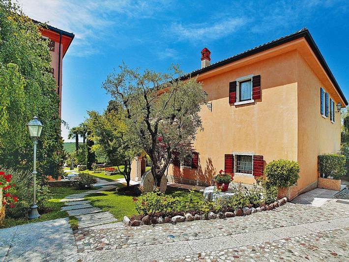 Location de vacances pour 4 personnes, avec Jardin ainsi que Bassin pour enfant et Piscine à Costermano