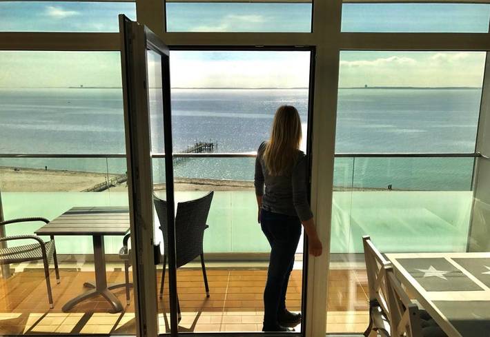 Ferienwohnung für 4 Personen, mit Balkon und Pool sowie Sauna und Seeblick in Neustadt in Holstein