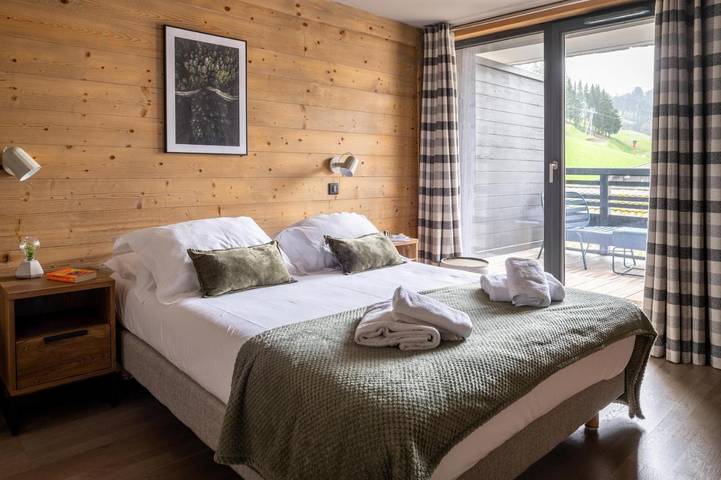 Gîte pour 10 personnes, avec Balcon ainsi que Terrasse et Vue dans Patinoire des Gets - 4